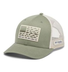 a green trucker hat with an american flag on the front and fish in the back