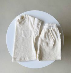 Hey there beautiful mamas! Say hello to our adorable Boho Comfy Loose Textured Tee + Shorts Seperates! Super comfy and definately something thay your little ones will absolutely adore! Each outfit set in our collection captures a perfect blend of casual comfort and boho-chic sophistication, and they come in 2 absolutely stunning and muted colors. Crafted from an organic 100% eco friendly fabric that is as comfortable as it is stylish, the outfits are designed to keep your baby feeling cozy all d Triangle Bag, Summer Baby Clothes, Pink Rompers, Short Sleeve Romper, Matching Shorts, Baby Shorts, Loose Shorts, Sleeved Romper, Pink Shorts