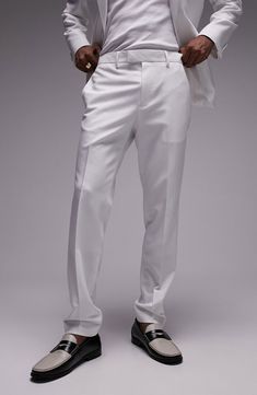 A slim fit lends contemporary appeal to bright-white tuxedo pants made from smooth, stretch-woven fabric. Zip fly with hook-and-bar closure Side-seam pockets; back button-welt pockets 77% polyester, 17% viscose, 6% elastane Machine wash, line dry Imported White Slim Fit Bottoms For Business Casual, White Slim Fit Straight Leg Dress Pants, White Straight Leg Dress Pants For Business Casual, White Straight Leg Pants For Formal Occasions, White Tapered Leg Formal Pants, White Slim Fit Dress Pants, White Slim Fit Pants With Straight Hem, Spring Tuxedo Style Fitted Pants, Classic White Business Dress Pants