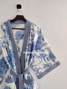 This kimono is made very neatly, and the matching strap has also been used in almost many places in the kimono, which makes the kimono very much. giving a beautiful look It looks good in the photo, but it looks great after wearing this kimono 100% Soft Cotton Hand Block Print Fabric Robe. The perfect to cover up your dance costume, to use for a dinner party or just slip into in on a beautiful summer morning. This particular beauty has a Japanese feeling to it. Cotton kimono robes are perfect for lounging around the home or spa. Use our Floral Hand block print robe :) Measurements: Size: Short & Free Size/ Plus Size Bust Approx: 120 CM ( 47 inch ) You can choose any length in this listing Length: 80 CM, 100 CM, 120 CM, 140 CM You can choose any color in the this listing * BLUE TIGER  * DARK Fancy Robes, Night Wear Dress, Kimono Robes, Summer Kimono, Printed Robe, Cotton Kimono, Short Kimono, Boho Kimono, Block Printing Fabric