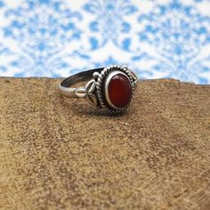 SOLnSILVER Handmade Authentic Gemstone Bohemian 925 Silver Jewelry Carnelien Leaf Design Ring, 925 Sterling SIlver Ring, Handmade Red Stone Statement Ring, Best Selling Item, Trending Gift Item Handmade Ring - Stone Polish - High - Silver Polish - High - Stone Name -  Carnelien   - Stone Shape -  Oval  - Design Shape  - Oval  - Stone Color -  Red - Stone Category -  Cabochon - Metal - Sterling Silver - Metal Purity - 925 parts per 1000 Why To Wear Silver As a metal, silver has significant health Silver Carnelian Rings Spiritual Style, Silver Carnelian Spiritual Ring, Spiritual Red Ruby Ring In Sterling Silver, Silver Carnelian Ring As A Gift, Silver Carnelian Rings For Gift, Red Oval Rings With Natural Stones, Spiritual Red Sterling Silver Ring, Silver Carnelian Ring Stamped 925, Silver Carnelian Ring