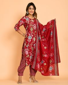 Suit Traditional Floral Print Festive Pants, Red Floral Print Straight Kurta Set, Bollywood Style Festive Pant Set With Floral Print, Red Floral Print Palazzo Set With Straight Kurta, Festive Bollywood Pant Set With Floral Print, Bollywood Style Festive Floral Print Pant Set, Bollywood Style Festive Floral Pant Set, Traditional Floral Print Festive Pant Set, Elegant Red Palazzo Set With Printed Motifs