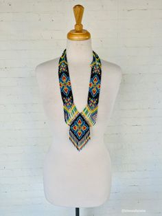 This authentic beaded necklace set is the perfect addition of color, style, and beauty to any outfit! It's completely handmade, and pictures don't justice this piece of art! Each Jewelry Set that we sell is authentic and one-of-a-kind! You will receive the exact item photographed. Find more colors and design available at https://www.etsy.com/shop/LatinxsCulturaViva?ref=simple-shop-header-name&listing_id=978618601&section_id=27352905&page=1#items This JEWELRY SET is very representative of the Hui Traditional Multicolor Beaded Necklaces As Gift, Traditional Multicolor Necklace With Black Beads, Artisan Multicolor Jewelry With Black Beads, Multicolor Beaded Chain For Festival, Colorful Bohemian Beaded Necklaces With Large Beads, Artisan Multicolor Beaded Chain Necklace, Colorful Adjustable Beaded Necklaces With Large Beads, Adjustable Multicolor Beaded Necklaces With Large Beads, Adjustable Multicolor Beaded Necklace With Large Beads