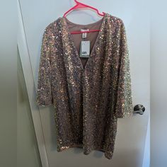 H&M Loose Fitting Sequin-Shirt Dress In Light Pink/Champagne Color. Size M H&m Sequin Dresses For Party Season, H&m V-neck Mini Dress For Party, H&m Long Sleeve Party Dress, H&m Cocktail Dress For Party Season, H&m Cocktail Dresses For Party Season, H&m Sequin Dresses For Spring, H&m Spring Dresses With Sequins, H&m V-neck Party Dress, H&m V-neck Mini Dress For Night Out