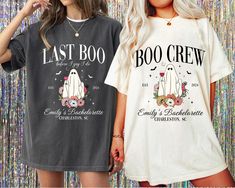 two women wearing halloween t - shirts with the words last booo crew on them