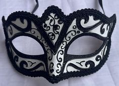 This decorative design white and black venetian style masquerade mask is new. This mask is with ribbon tie concept to create a comfortable fit and great to reuse if needed. Masquerade mask Measurements:  10" inches across 4" inches high This beautiful masquerade mask is great for a birthday party, wedding or Halloween costume party. We do our best to take live, clear and as many pictures as possible to guarantee what you see is what you will receive. Any issues with the purchased product(s) must Black And White Masquerade Mask, Black And White Mask, White Masquerade Mask, Mask Masquerade Ball, Mask Venetian, Masquerade Ball Mask, Ball Mask, Party Mask, Mask Masquerade