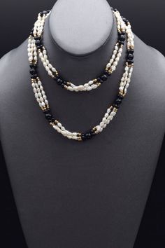 Discover the allure of vintage glamour with this exquisite 14K yellow gold necklace featuring lustrous pearls and onyx beads. A timeless piece that adds sophistication to any outfit. Elevate your style with this classic beauty! #VintageJewelry #GoldNecklace #PearlAndOnyx 14k Yellow Gold Necklace, Yellow Gold Necklace, 14k Gold Necklace, Onyx Bead, Vintage Glamour, Classic Beauty, Gold Pearl, Bead Strand, Strand Necklace