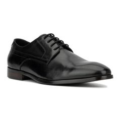 Looking to step up your office shoe game? The Elias oxford might just be what you've been searching for. Crafted from a smooth genuine leather upper, this timeless and classic style features an elegant lace-up design that exudes sharpness without being ostentatious. Perfect for adding sophistication to your professional attire, the Elias oxford ensures you look polished and refined in any office setting, making it a must-have for your wardrobe. Black Wingtip Leather Shoes For Business, Black Wingtip Leather Shoes For Business Meetings, Black Round Toe Oxfords For Business Meetings, Black Leather Sole Dress Shoes For Business Meetings, Black Dress Shoes With Leather Sole For Business Meetings, Classic Round Toe Oxfords For Business Meetings, Black Leather Oxfords For Business Meetings, Modern Plain Toe Oxfords For Business, Masculine Cap Toe Dress Shoes For Business