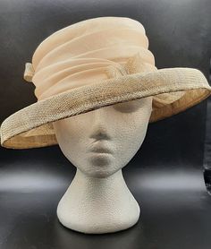 Vintage Fashion Hat Andre Canadian Hat Company Beige Lightweight Summer Ribbon I had the fortunate opportunity to go to an estate sale where the lady who lived there collected hats.  I have close to 100 hats; some are designer and some are handmade. This one comes with a hat box, 2001 Gabriela Ibarra Art in Motion. The entire hat measure 12 1/2" x 11 3/4" x 4 3/4" high.  The inner brim is 7" x 6 1/4".  The hat has more of a sheen to it like in the second photo. This hat is handmade in Canada. Ge In Motion, Art In Motion, Elegant Hats, Hat Box, Hot Flashes, Epiphany, The Lady, Hat Fashion, Estate Sale