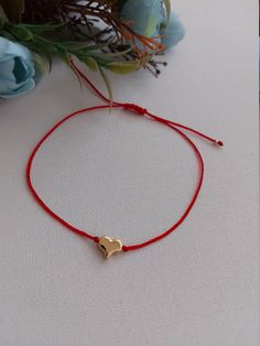 Red heart bracelet is a nice Christmas gift, Valentine's day gift, birthday gift, wedding gift, bridesmaid gift and other special day gift for her. *Handmade, carefully crafted with passion. *Very simple and stylish, *Made to order, *Comes packaged in a gift bag. *Red is the symbol of life and flowing in the veins human blood. The red thread worn to protect from negative energy and as an amulet for health, luck and love. Bracelet size:adjustable. Elegant Adjustable Heart Bracelet As Gift, Minimalist Heart Charm Bracelet For Valentine's Day, Minimalist Jewelry For Friendship On Valentine's Day, Minimalist Heart-shaped Friendship Bracelets For Valentine's Day, Elegant Heart-shaped Bracelet For Gift, Minimalist Heart-shaped Valentine's Day Friendship Bracelets, Dainty Charm Bracelet For Friendship On Valentine's Day, Minimalist Heart Charm Bracelet For Gift, Dainty Handmade Bracelets For Bridesmaids