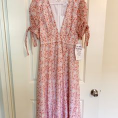 Pink Ditsy Organza Midi Dress Size Small. New With Tags, Nwt, In Perfect Condition Just Didn’t Fit Me And Too Late To Return! Spring Knee-length Ditsy Floral Midi Dress, V-neck Floral Dress With Ditsy Print For Daywear, Spring Maxi Dress With Ditsy Floral Print For Brunch, White Midi Dress With Ditsy Floral Print, White Knee-length Midi Dress With Ditsy Floral Print, Spring Ditsy Floral Print Maxi Dress For Brunch, Spring Sundress With Ditsy Floral Print, Spring Daywear Midi Dress With Ditsy Floral Print, Ditsy Floral Print Knee-length Midi Dress For Brunch