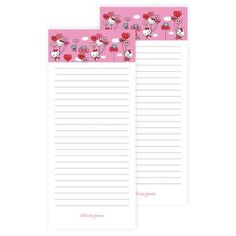 two pink notepads with hello kitty and flowers on them, one is blank for writing