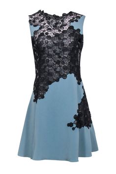 Unleash your inner siren with Versace's blue dress, accented with black and sheer lace applique details. Perfect for a special night out, pair it with strappy sandals and a mini bag for a sexy, head-turning look. Size 8 (IT 42) Made in Italy Shell 60% Triacetate, 40% Polyester Shell 2 90% Polyester, 10% Polyurethane Missing lining Invisible side zipper Open back detail Bust 38" Waist 34" Shoulder to hem 36" Sleeveless Contrast Lace Night Out Dress, Sleeveless Contrast Lace Dress For Night Out, Chic Cocktail Dresses With Contrast Lace, Chic Lace Dress With Illusion Neckline, Chic Blue Scalloped Lace Dress, Spring Dress With Contrast Lace For Date Night, Spring Lace Dress With Illusion Neckline, Spring Date Night Dress With Contrast Lace, Spring Date Night Dresses With Contrast Lace