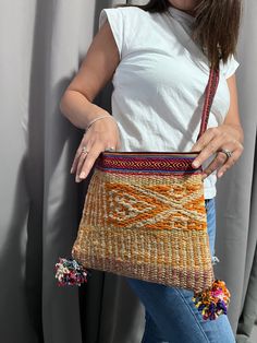 "GIFTS FOR HER ♥ Ethnic Boho Bag. These Peruvian Casual Bags are made with hand woven fabric in Cusco. Variety of bright colors combinations. Each bag is as the pictures show but colors could be a little different depending on the screen. Crossbody Long shoulder strip 46 inches. Measurement: 9 x 10 inches approximately. HANDMADE IN PERU BY BUYING THIS ITEM, YOU ARE HELPING PERUVIAN ARTISANS FORM THE ANDEAN COMMUNITIES AND THEIR FAMILIES. \"When you buy our products your are supporting a Peruvian Bohemian Pouch Bags For Vacation, Bohemian Woven Satchel For Summer, Bohemian Style Summer Satchel, Bohemian Beach Crossbody Satchel, Eco-friendly Multicolor Festival Bag, Bohemian Straw Pouch Bag With Adjustable Strap, Traditional Straw Bag With Adjustable Strap For Everyday, Bohemian Shoulder Bag With Adjustable Strap In Natural, Bohemian Brown Pouch Straw Bag