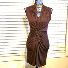 This Nwt Casual Couture By Green Envelope Dress In Taupe/Brown Is A Must-Have For Any Fashion-Forward Woman. The Ruched Design Adds A Touch Of Elegance To The Otherwise Simple Yet Chic Sleeveless Dress. Made From A Comfortable And Stretchy Material Blend Of 95% Rayon And 5% Spandex, This Dress Is Perfect For Any Occasion, Whether It's A Party Or A Romantic Dinner. The V-Neckline And Pullover Closure Make For An Easy And Effortless Fit, While The Dress Length Is Short Enough To Show Off Your Legs Sleeveless Ruched Mini Dress For Work, Sleeveless Brown Mini Dress For Work, Chic Fitted Brown Sleeveless Dress, Brown Sleeveless Mini Dress For Work, Chic Brown Sleeveless V-neck Dress, Chic Brown V-neck Sleeveless Dress, Fitted Sleeveless Brown Dress For Work, Fitted Brown Sleeveless Dress For Work, Brown Fitted Sleeveless Dress For Work