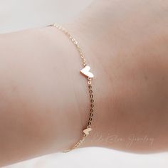 Dainty graduating small heart disc stacking bracelet made in 14K solid gold * Metal: 14K Yellow Gold * Coin size: approx. 3-6mm * Length: adjustable, total of 6.75" approx. * Stamp: 14K * Guaranteed Authentic Solid Gold, Not Plated or Filled ❤️Visit our official website for exclusive new products. https://elekalonjewelry.com/ ❤️Follow us on Instagram @ elekalonjewelry for the latest projects and much more! ❤️If you have any questions, please feel free to message us. Delicate Adjustable Heart Bracelet For Anniversary, Dainty Heart-shaped Stackable Jewelry, Dainty Adjustable Bracelet With Heart Pendant, Dainty Adjustable Heart Pendant Bracelet, Adjustable Heart-shaped Delicate Chain Bracelet, Adjustable Delicate Heart-shaped Chain Bracelet, Adjustable Delicate Heart Shaped Chain Bracelet, Adjustable Delicate Heart Chain Bracelet, Stackable Heart Bracelet For Valentine's Day