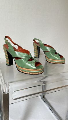 1970's Casuccio & Scalera light green leather and cork platform sandals.  Size IT37 Heel: 10 cm / 3,9'' Platform: 2,5 cm / 0,9'' Sole: 23,5 cm / 9,2'' Material: Leather, Cork Great vintage condition. Vintage Green Round Toe Heels, Vintage Green Heels With Round Toe, High Heel Cork Sandals For Spring, Spring High Heel Cork Sandals, Spring Cork Heels With Round Toe, Retro Sandals With Sculpted Heel For Spring, Retro Sculpted Heel Sandals For Spring, Green Heels With Wooden Heel For Spring, Spring Green Heels With Wooden Heel