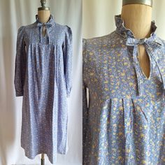 Rare original Laura Ashley maxi dress in a prairie style Cotton fabric with an almost flannel hand Periwinkle blue with a ditsy berry print Puffed long sleeves with a 1 1/2 inch cuff Ruffle collar and ties Pin tucks  Pockets at side seams  Label - laura ashley  Made in Carno Wales in the 70s when the prairie style was manufactured UK 12 - this is a vintage size, the garment measures more like a UK 8 possibly 10 as the back measurement is only 13" across  EUR 38 - again a vintage size, more like Cottagecore Prairie Dress For Gatherings, Cotton Prairie Dress For Daywear, Cotton Prairie Dress For Fall In Cottagecore Style, Cotton Cottagecore Prairie Dress For Fall, Cottagecore Cotton Prairie Dress For Fall, Cottagecore Prairie Dress With Floral Print For Daywear, Cottagecore Prairie Dress With Ditsy Floral Print For Spring, Pastoral Cotton Prairie Dress For Daywear, Pastoral Prairie Dress In Cotton For Daywear