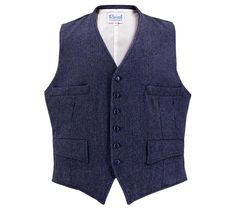 Our new Granville waistcoat is inspired by original vintage 1930s - 1940s era waistcoats from our own archive collection. This classic cut of waistcoat is shorter in the body, to wear with high-waisted trousers. It's made of a navy blue herringbone wool weave, and features a six-button fastening, with navy blue mother-of-pearl effect buttons. A highly-requested Revival own-brand classic, this authentically styled men's vest is designed to be worn with a matching pair of our Granville notch-back Classic Notch Lapel Vest For Winter, Tailored Vintage Winter Vest, Vintage Formal Winter Vest, Vintage Workwear Vest Outerwear, Vintage Wool Vest For Formal Occasions, Tailored Vintage Wool Vest, Vintage Workwear Vest, Vintage Tailored Single Breasted Vest, Vintage Tailored Single-breasted Vest