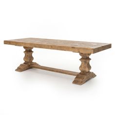 an old wooden table on a white background with no one around it or someone else