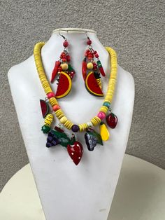 "Vintage kitsch tropical colorful fruits wood necklace with dangle earrings. No labels. Necklace size length 19\" width 1-2\" earrings 4\" Drop width 1-1.5\". Good condition" Multicolor Wooden Beads Jewelry For Summer, Summer Multicolor Fruit Design Jewelry, Multicolor Dangle Jewelry With Wooden Beads, Traditional Wooden Beads Dangle Jewelry, Traditional Dangle Jewelry With Wooden Beads, Boho Tropical, Colorful Fruit, Vintage Kitsch, Wood Necklace