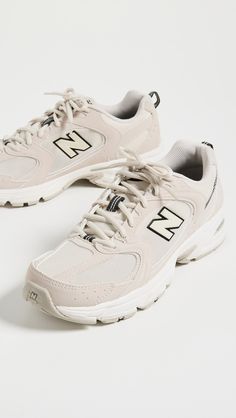 New Balance 530 Unisex Sneakers | Shopbop Classic Lace-up Walking Shoes With Air Cushioning, Classic Cushioned Lace-up Running Shoes, Functional New Balance Walking Shoes With Round Toe, Classic New Balance Lace-up Walking Shoes, New Balance Walking Shoes With Cushioned Footbed For Streetwear, New Balance Casual Outdoor Sneakers, Casual New Balance High-top Walking Shoes, Casual High-top New Balance Walking Shoes, Casual New Balance Sneakers For Outdoor