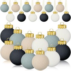 a bunch of different colored ornaments hanging from strings on a white background with gold trimmings