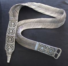 Vintage Woven Indian Silver braided belt with hearts.  39" long, 2" wide.  24.2 ounces of 925 silver. Purchased in Bombay Silver Bazzar 1970's. Hand made in India circa 1920  can wear as is or needs 1 easy slight repair with silversmith Vintage Silver Belt Buckles For Festival, Vintage Silver Engraved Belt, Vintage Silver Embroidered Belt, Vintage Silver Adjustable Belt, Silver Belt, Silver Belts, Braided Belt, Silver Anklets, Suspender Belt