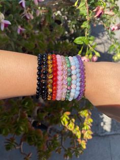 "These cute bracelets are hand-stringed by me! you can stack multiple, add them to your existing collection, or just wear one for the properties! Only 10 different crystal bracelets are pictured. My wrists are small so they may look smaller in you! (left to right): black tourmaline, gold sheen obsidian, tigers eye, carnelian, rose quartz, ametrine, ruby in zoisite, morganite, angelite, and amethyst :) **New bracelets are not pictured but feel free to ask for pictures! There will always be new br Adjustable Crystal Bracelet With Round Beads For Everyday, Adjustable Casual Crystal Bracelet With Round Beads, Casual Crystal Bracelet With Gemstone Beads, Casual Crystal Bracelet With 8mm Beads As Gift, Casual Crystal Bracelet With 8mm Beads For Gift, Dainty Hypoallergenic Beaded Bracelets For Healing, Adjustable Casual Crystal Bracelet For Everyday, Hypoallergenic Dainty Beaded Bracelets For Healing, Casual 8mm Beads Crystal Bracelet Gift