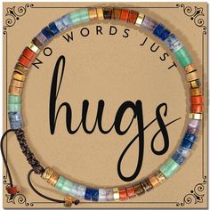 a sign that says no words just hugs with colorful beads on the front and side