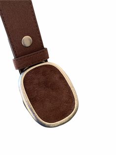 A dark brown suede belt buckle is a wardrobe staple that really makes a fashion statement. The oval suede buckle is easy to add to your favorite belt. Dress up your outfit with some bling when it needs a little extra something. The buckle can be paired with many of Brooklyn Buckles interchangeable snap belts.  This listing is for a buckle only but the belt can be purchased for an additional cost. This buckle looks great with a brown belt.  The buckle fits belts up to a belt width of 1 1/2 inches Oval Belt, Cowgirl Belt, Leather Belt Buckle, Handmade Leather Belt, Western Belt Buckles, Western Belt, White Plains, Online Friends, Suede Belt