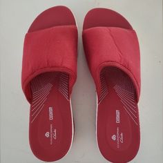 Shop andreastrove's closet or find the perfect look from millions of stylists. Fast shipping and buyer protection. Cloudsteppers by Clarks slip on sandals, red and white, size 9m, cushion soft, 1 3/4" at heel and graduates to 1" thick. Super comfy ! Never used Closed Toe Synthetic Slippers With Ortholite Insole, Closed Toe Slippers With Ortholite Insole, Red Comfortable Slip-on Slippers, Comfortable Red Slip-on Slippers, Slip-on Synthetic Sandals With Red Sole, Red Synthetic Closed Toe Slippers, Red Synthetic Slippers, Red Slip-on Synthetic Sandals, Comfortable Red Sandals With Round Toe