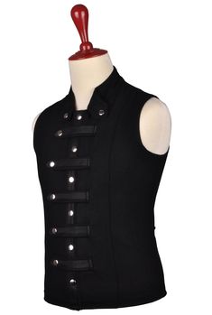 Black Wool Sleeveless Steampunk Shirt / Gothic Street Vest This Winter rock the streets with this amazing Steampunk Fashion Sleeveless Shirt / Gothic Vest. Made of premium quality wool and brass materials this vest is going to be a superb add to your steampunk / gothic collection. Custom body measurement design will give an extra mile of attractiveness and perfect fit. Premium Quality Black Wool Silver Snaps (Brass) Wool made Closure Straps with Nylon Braid Full Polyester Lining Single Needle Do Gothic Sleeveless Vest, Sleeveless Vest For Alternative Fashion In Fall, Edgy Sleeveless Tank Top For Fall, Edgy Fitted Tank Top For Fall, Black Punk Vest For Cosplay, Gothic Sleeveless Tank Top For Alternative Fashion, Edgy Black Vest For Fall, Alternative Style Black Vest Top, Edgy Sleeveless Vest For Fall