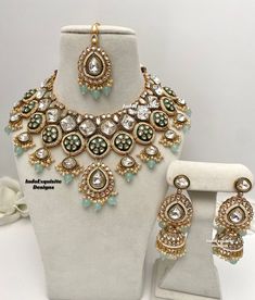 Premium quality Kundan Necklace comes with elegant Jhumki Earrings and Tikka/ Indian Jewelry/Premium Quality Polki and Kundan Jewelry All items are shipped from Brampton, Ontario, Canada. If you need your item by a certain day, please reach out to us for express delivery option before placing the order so that we can update the shipping for you. Standard shipping/delivery timeline Below are the delivery timeline estimates. We dispatch all orders by the next business day. ---> USA delivery timeli Heavy Kundan Jewelry For Anniversary, Round Jewelry Sets For Diwali Reception, Kundan Cutdana Jewelry For Anniversary, Bollywood Kundan Jewelry For Anniversary, Meenakari Kundan Jewelry For Anniversary, Kundan Jewelry With Cutdana For Anniversary, Heavy Kundan Bridal Necklace For Anniversary, Bollywood Style Kundan Jewelry For Anniversary, Traditional Kundan Bridal Necklace For Anniversary