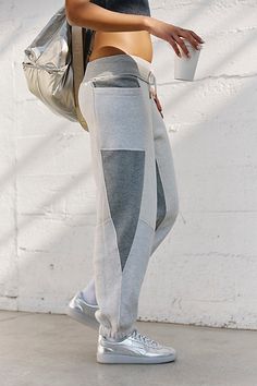 Add a little something extra to every activewear ‘fit with these timeless joggers featured in a classic silhouette with defined color-blocking throughout for the ideal dimensional finish. **Fit:** Classic, relaxed fit **Features:** Low-rise style; drawstring detail at waistband; elasticated ankles; side pockets **Why We ❤ It:** The perfect throw-on-and-go pair to take with you pre- and post- workout. | Making It Joggers by FP Movement at Free People, Mixed Heather Combo, S Fp Movement, Post Workout, Small Waist, Boho Outfits, Heathers, Low Rise, Color Blocking, Active Wear, Free People