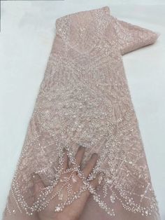 This high quality Fabric is measured in 5 Yards With Embroidered Beading and Sequin. It is soft, very delicate and beautiful. This high Quality Fabric is made with Fashion embroidered rhinestones can be used in making party wedding dresses, skirts, shawls, scarves and other other fashion apparels as you would like. Size : Length : 5 yards (180 inch). Width: 50 inch (Please allow slight deviation for the measurement data ,±1 inch) Material: 100% Polyester, Tulle Lace Fabric, Eco-Friendly embroide Elegant Wedding Sequin Fabric, Elegant Rhinestone Embroidered Fabric For Banquet, Elegant Beaded Sequin Fabric For Wedding, Elegant Wedding Sequin Fabric With Pearl Embroidery, Elegant Embroidered Fabric With Rhinestones For Wedding, Elegant Rhinestone Embroidered Fabric For Weddings, Elegant Sequin Fabric With Pearl Embroidery For Banquet, Elegant Pink Embroidered Sequin Fabric, Elegant Pink Embellished Sequin Fabric