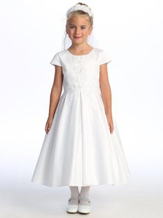 Introducing the Gorgeous White First Communion Dress by Lito – a great blend of elegance and charm that will make your sweet girl shine on her special day. Impeccably tailored, this dress features a flattering A-line silhouette and boasts intricately embroidered tulle adorned with delicate sequins, adding a touch of subtle sparkle that captures the essence of the occasion.Designed with your convenience in mind, the dress features a practical zipper closure, ensuring easy and hassle-free dressing Elegant A-line Confirmation Dress, Elegant Fitted Confirmation Dress, Elegant Fitted Dress For Confirmation, Fitted Satin Dress For Confirmation, Satin Fitted Dress For Confirmation, Elegant Fitted First Communion Dress For Formal Occasions, Short Sleeve Dress With Fitted Bodice For Confirmation, Elegant Embroidered Fitted Princess Dress, Elegant First Communion Dress With Fitted Bodice