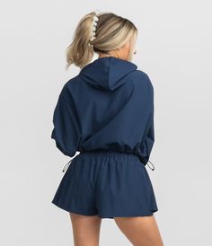 Elevate your wardrobe with the Hybrid Cropped Hoodie – where comfort, fashion, and performance seamlessly converge for any casual occasion. Maggie is 5’6" and is wearing a small Hybrid Cropped Hoodie in Classic Navy. Skort Styling, Classic Skort, Crop Hoodies, Athleisure Accessories, Womens Skorts, Sporty Fashion, Flannel Sweatshirt, Southern Shirt, Comfort Fashion