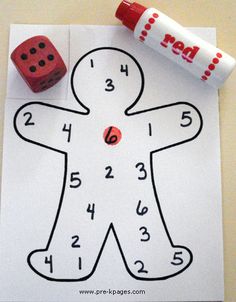 a paper cut out to look like a ginger with numbers and dices on it