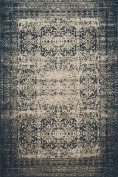 an area rug with blue and beige colors