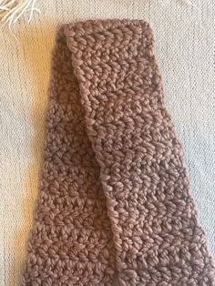 Crochet Children's scarf made with 100% wool yarn.  One size fits most. One Size Wool Scarves For Winter, Warm Wool Scarves For Fall, Warm Wool Scarf For Fall, Soft Knit Wool Scarves For Fall, Brown Casual Scarves For Cold Weather, Casual Brown Scarves For Cold Weather, One Size Alpaca Scarves For Fall, Knitted Wool Scarves For Fall, Brown Wool Scarves For Cold Weather