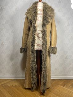 60s Fur Coat, Fitted Faux Fur Coat For Cold Weather, Fitted Long Fur Coat For Winter, Long Winter Outerwear With Faux Fur Trim, Long Faux Fur Coat With Faux Fur Lining, Fitted Long Fur Coat For Cold Weather, Long Fur Coat With Feather Trim For Winter, Long Sleeve Fur Coat With Feather Trim For Winter, Winter Fur Coat With Feather Trim And Long Sleeves