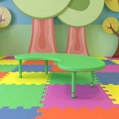 a child's playroom with colorful rugs and trees