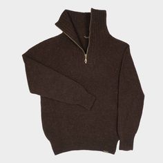 A classic and versatile staple, the quarter zip pullover features a high stand collar which can be worn zipper up or down. A great layering piece, as the recycled wool is great weight alone while not being too bulky to layer under a coat in the colder months.The recycled yarn has a unique combination of French virgin wool and off cuts of Le Laboureur’s classic Burel wool winter coats. The sustainable yarn keeps function as the heart of this classic everyday sweater.We are pleased to carry Le ... Classic Half-zip Winter Sweater, Classic Wool Half-zip Sweater, Half-zip Winter Outdoor Sweater, Winter Half-zip Outdoor Sweater, Winter Outdoor Half-zip Sweater, Winter Half-zip Outerwear With Ribbed Collar, Half-zip Fall Outdoor Sweater, Half-zip Fall Sweater For Outdoor, Classic Half-zip Winter Outerwear