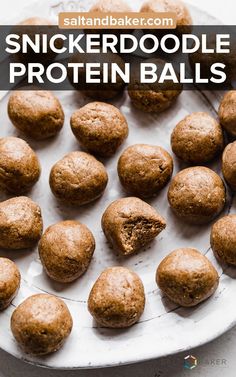 a plate full of chocolate protein balls with the words, snickkerdoodlee protein balls