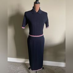 Brand New With Tags, Sold Out Everywhere Labeled Size 42 Thom Browne Polo Dress With Cable-Knit Bodice, Pleated Skirt, And Stripe Intarsia Spread Collar Short Sleeves; Ribbed Cuffs Ribbed Waistband A-Line Super Cute Navy Knit Dress In A Soft Stretchy Knit Flattering On Body. Would Fit A Size 4 To 6 Open To Offers Elegant Fitted Knitted Dress, Fitted Knitted Dresses, Formal Fitted Knit Dresses, Fitted Knit Dresses For Formal Occasions, Fitted Knitted Midi Dress, Elegant Fitted Pointelle Knit Sweater Dress, Fitted Pointelle Knit Dress With Short Sleeves, Fitted Knit Midi Dress For Work, Fitted Pointelle Knit Day Dress