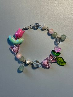 Matching tulip bracelets and phone straps & floral bracelets and earrings for the springtime. Spring Bracelets, Phone Straps, Spring Bracelet, Floral Bracelet, Tulips Flowers, Handmade Accessories, Spring Time, Mother’s Day, Tulips