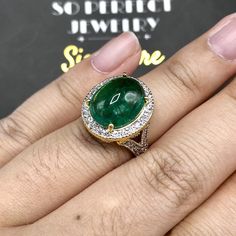 "ENJOY OUR WORRY-FREE SERVICE AND THE DAZZLING, GENUINE JEWELRY WE DESIGN AND HANDCRAFT WITH LOVE❤️ ABOUT THE ITEM: This ring is the perfect combination of elegance, beauty, and INVESTMENT VALUE! With a TRANSPARENT, 6.50 carats, VIVID FOREST GREEN emerald, and 52 extremely sparkling diamonds. The 18K yellow gold ring was deliberately designed and handcrafted by our boutique's in-house goldsmiths. You will love this gorgeous piece as much we do. And people will absolute adore it once they see the Luxury Yellow Gold Cabochon Diamond Ring, Luxury Diamond Cabochons For Wedding, Luxury Gold Diamond Cabochons, Luxury Round Cabochon Diamond Ring, Oval Gold Diamond Cabochons, Luxury Domed Cabochons For Anniversary, Yellow Gold Diamond Cabochons Fine Jewelry, Classic Diamond Cabochons For Anniversary, Formal Oval Cabochon Diamond Ring