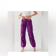 Boho Fabulous Elastic Waist Parachute Jogger Pants. Can Be Worn Wide Leg Or Jogger Style. Size (S) Color Violet) 100% Nylon Bundle With The Matching Puffer Vest Trendy Solid Straight Leg Parachute Pants, Trendy Stretch Parachute Pants, Trendy Parachute Pants With Elastic Waistband, Purple High-waisted Pants With Pockets, Purple Cargo Pants With Pockets For Spring, Trendy Straight Parachute Pants With Elastic Waistband, Purple Cargo Pants For Streetwear, Purple Streetwear Cargo Pants With Side Pockets, Casual Purple Cargo Pants With Pockets