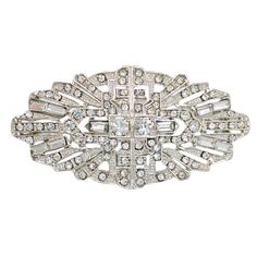 PRICES MAY VARY. Size: 2.63''X1.41'' Shape: Rectangle Materials: Alloy, crystal Type: Brooch Pins Presenting a fusion of modernity and antique charm, this Wedding Sash Bridal Belt Brooch in silver-tone plating showcases an oval shape and an open-back design for a unique and sophisticated look. Adorned with a meticulous blend of round and baguette-cut crystal rhinestones, each stone is meticulously set and inlaid to create a dazzling display of light, shine, and glitter. Inspired by the gorgeous Bridesmaid Boutique, Art Deco Brooch, Crystal Fashion, Wedding Sash, Bridal Belt, Bridesmaid Wedding, Antique Inspiration, Wedding Boutique, Crystal Art